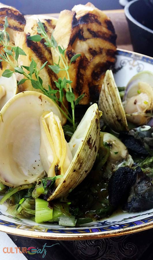 Sauteed Clams Oysters and Snails with Sea Greens