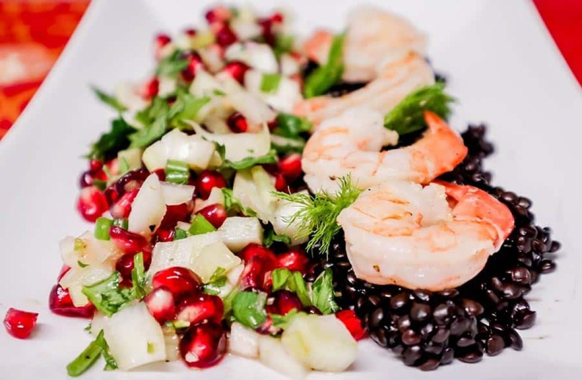 Shrimp Bedded on Beluga lentils Snuggled by Pomegranate Fennel Salsa