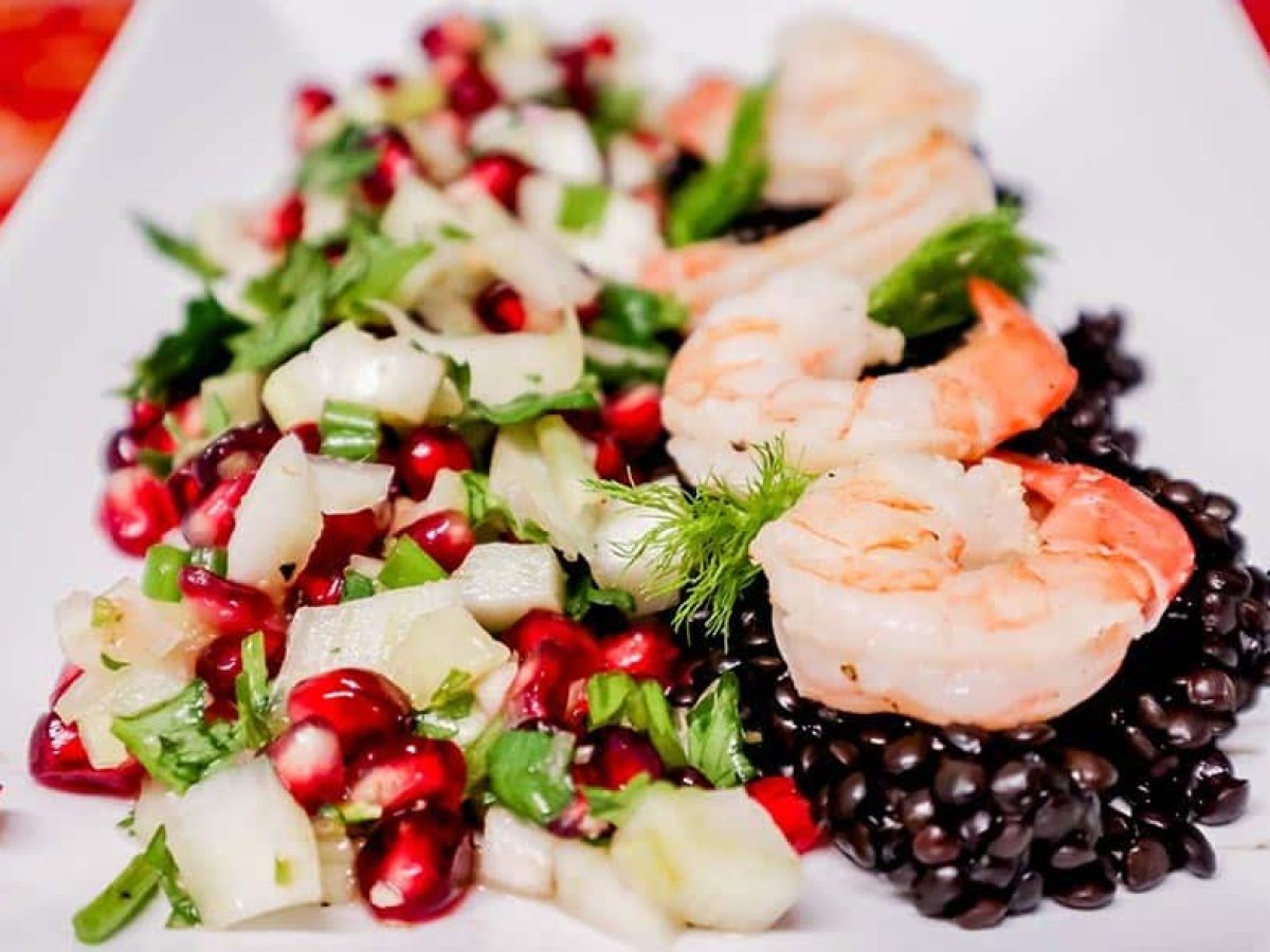 Shrimp Bedded on Beluga lentils Snuggled by Pomegranate Fennel Salsa