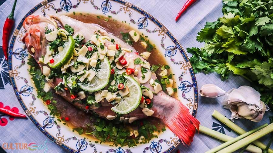 Thai Steamed Fish Recipe with Lime and Garlic Sauce | ปลากะพงนึ่งมะนาว